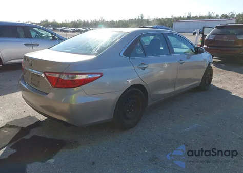 2016 Toyota Camry Le z USA, uszkodzony, nr VIN 4T1BF1FKXGU518668